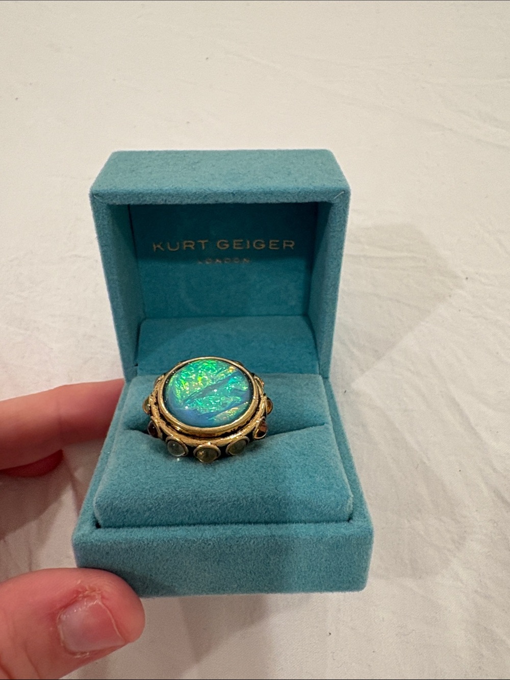 Kurt Geiger Gold-Tone Ring with Iridescent Blue-Green Stone
